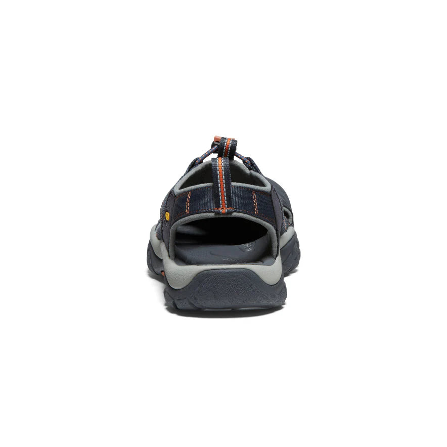 Back view of a gray sandal with orange accents on a white background