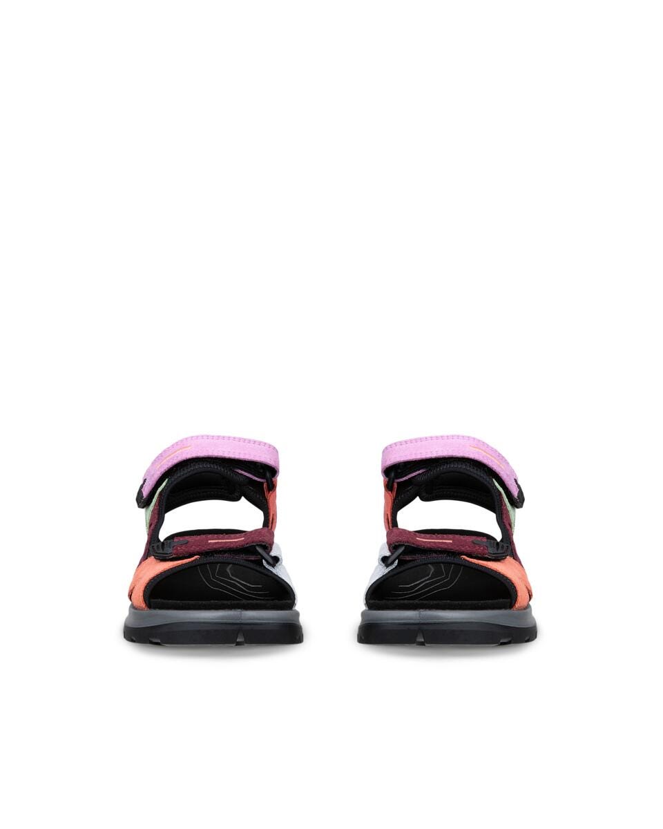 Black and pink sandals on a white background