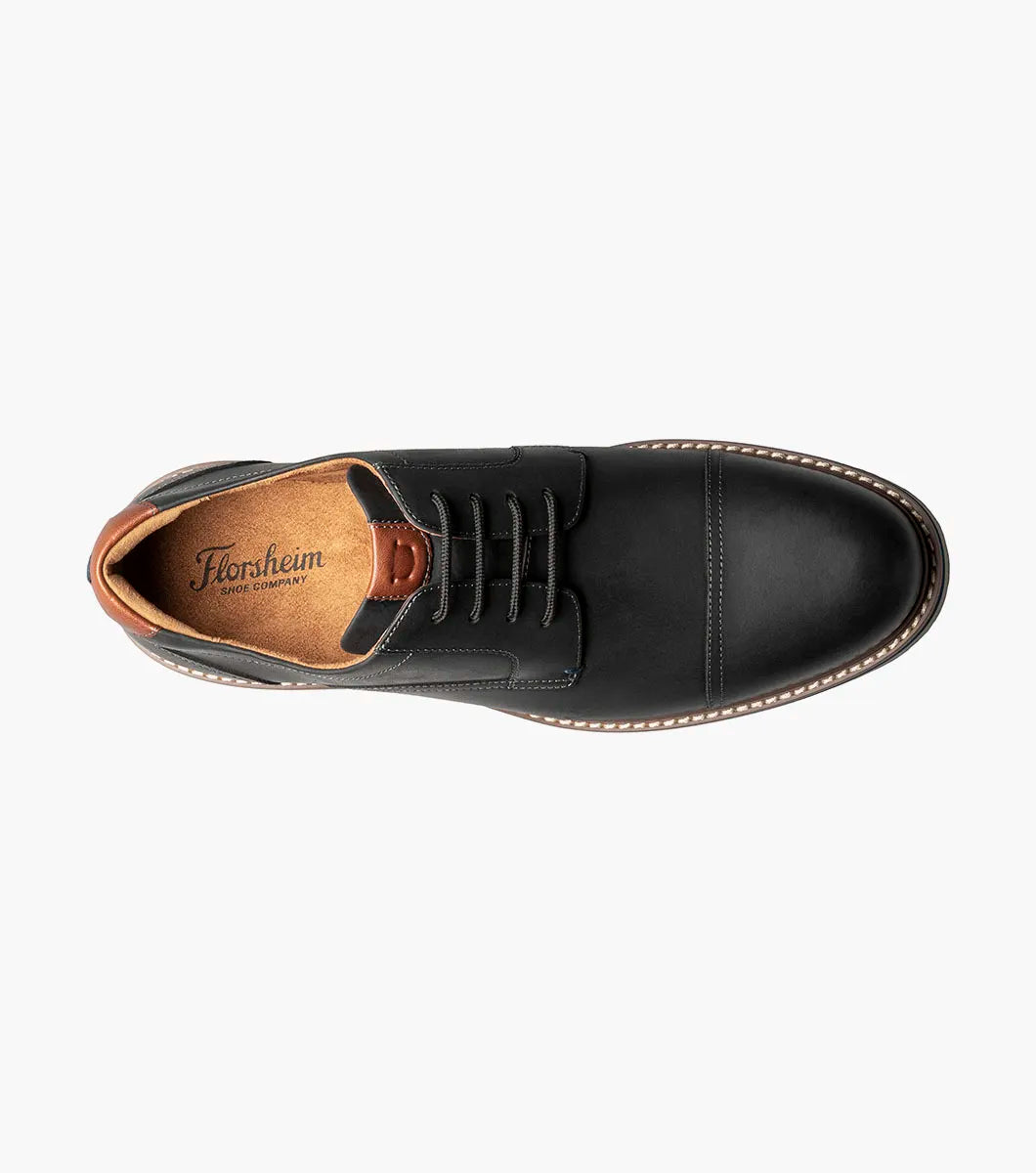 Black leather shoe with brand logo on a white background