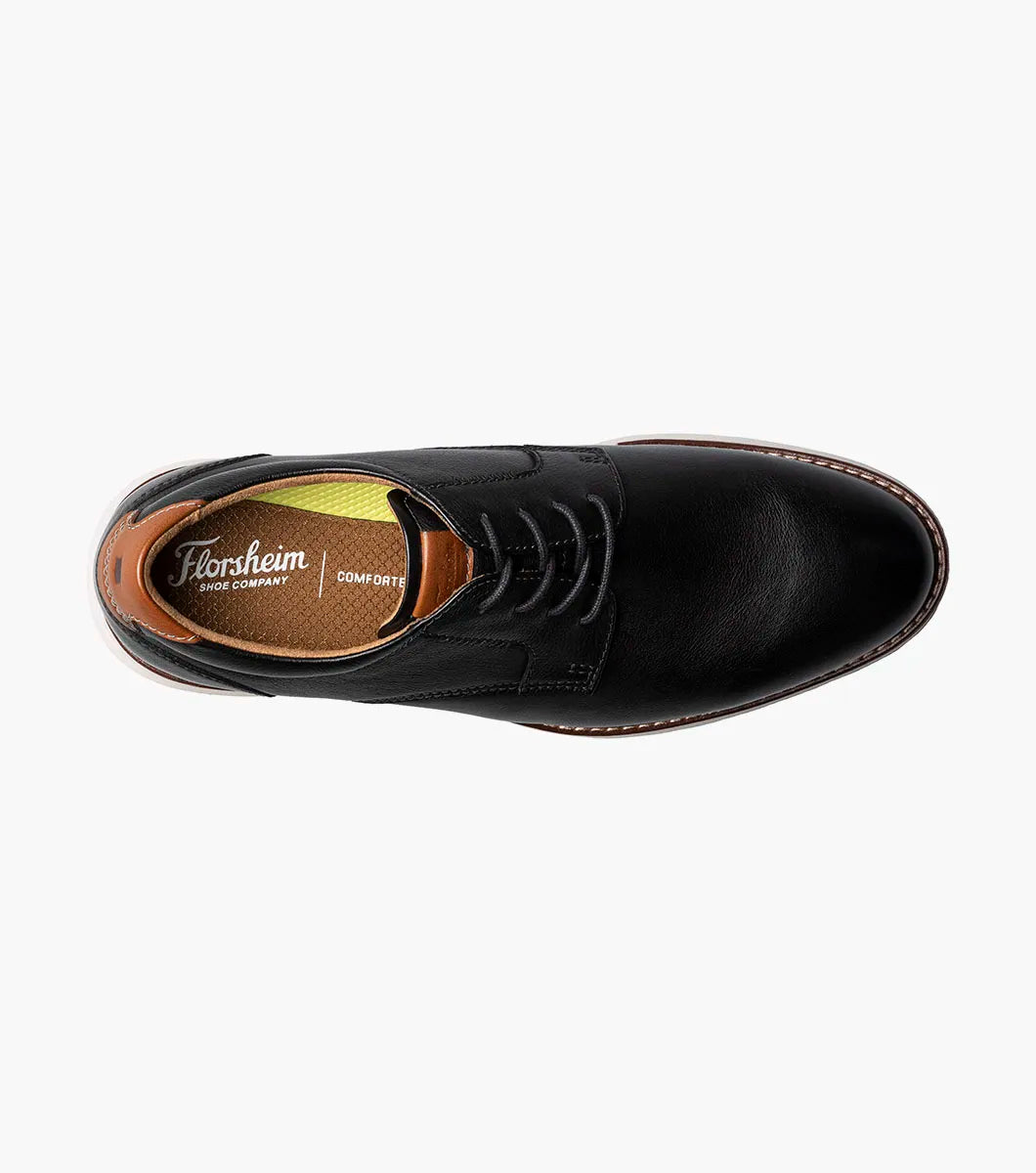 Black leather dress shoe with Florsheim branding on a white background