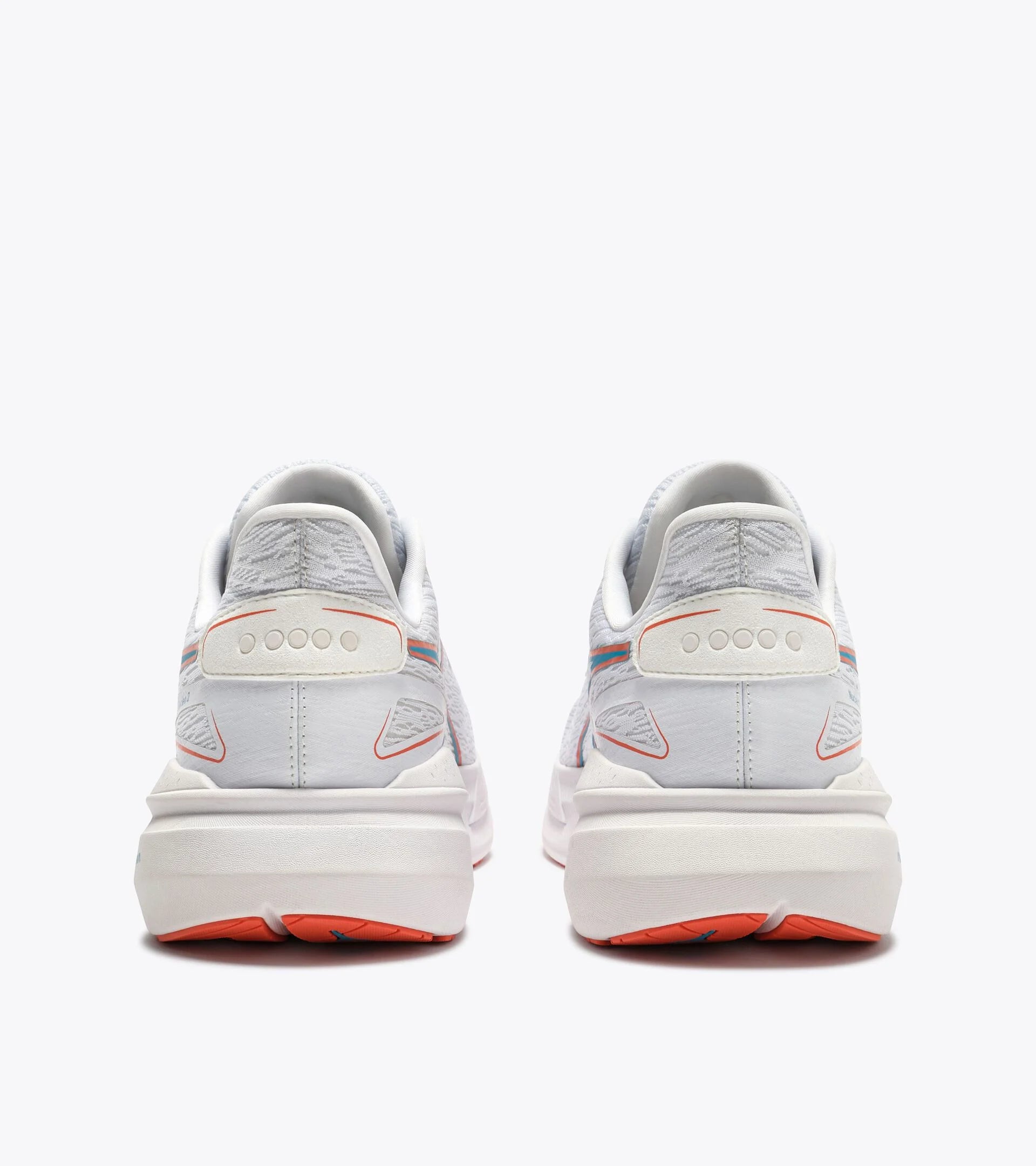 White sneakers with red accents on a white background