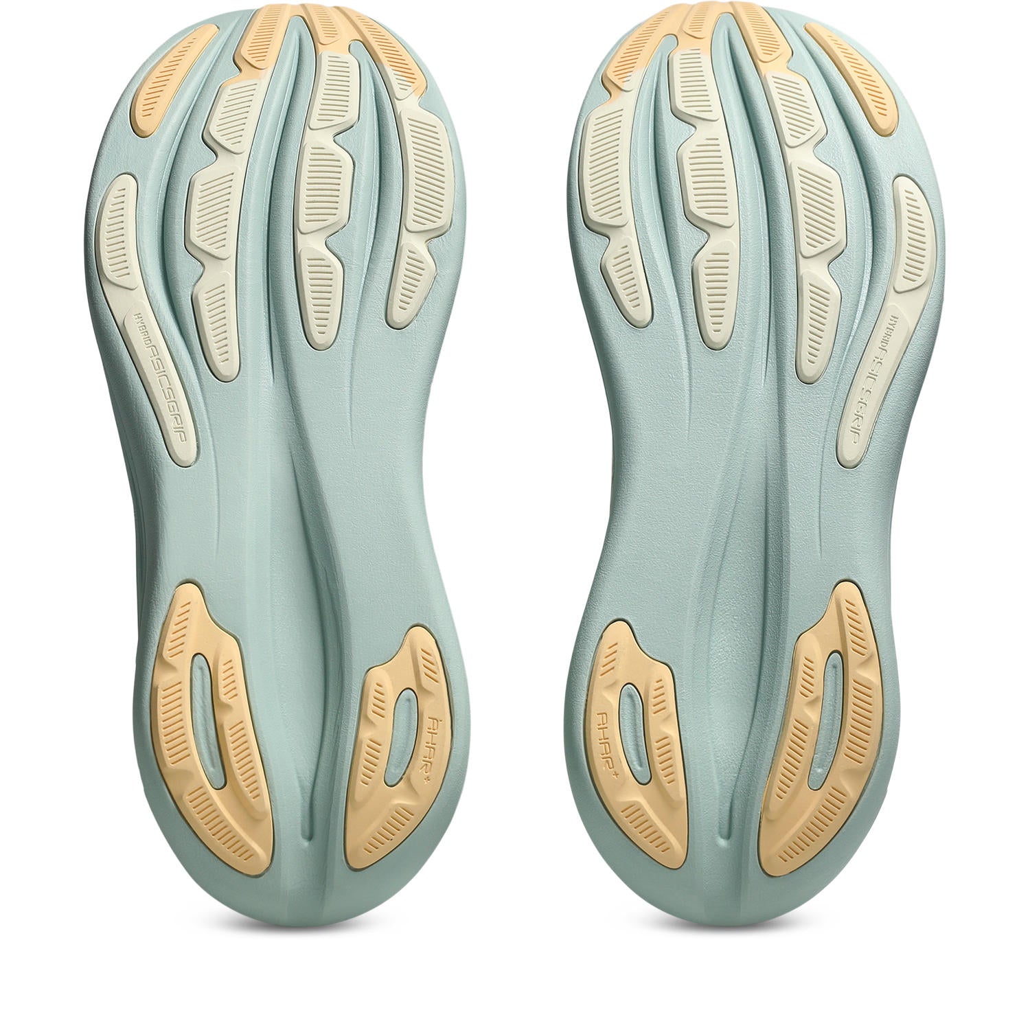Pair of green and beige shoe insoles on a white background