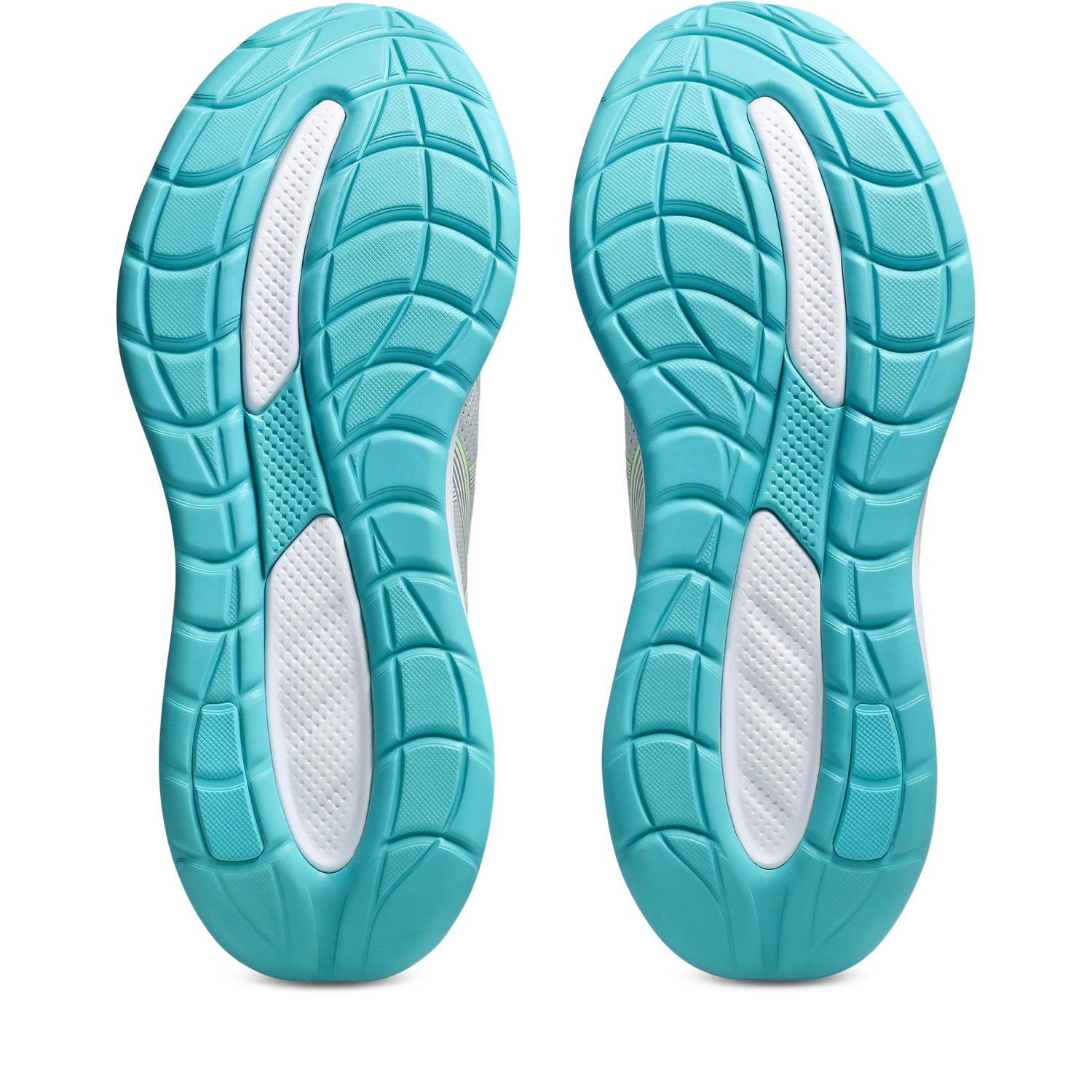 Turquoise and white shoe soles on a white background