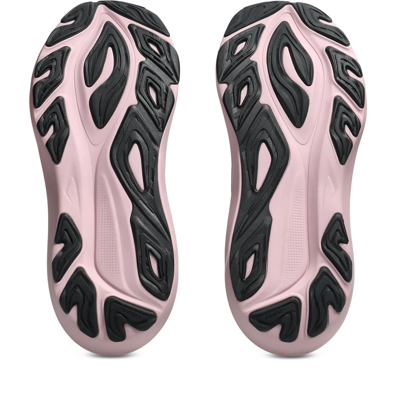 Pink and black athletic shoes with unique sole design on a white background