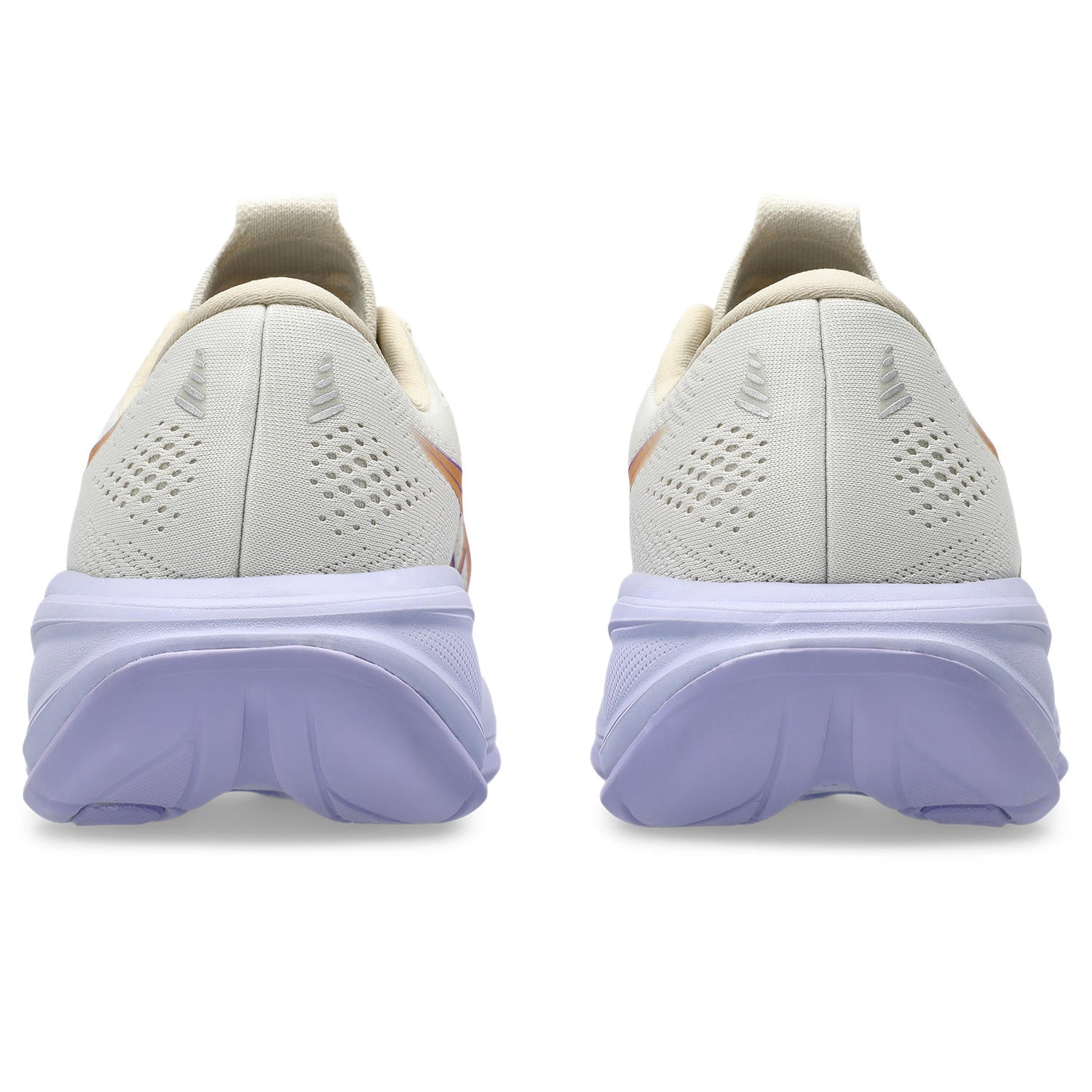 Pair of running shoes showing the sole on a white background
