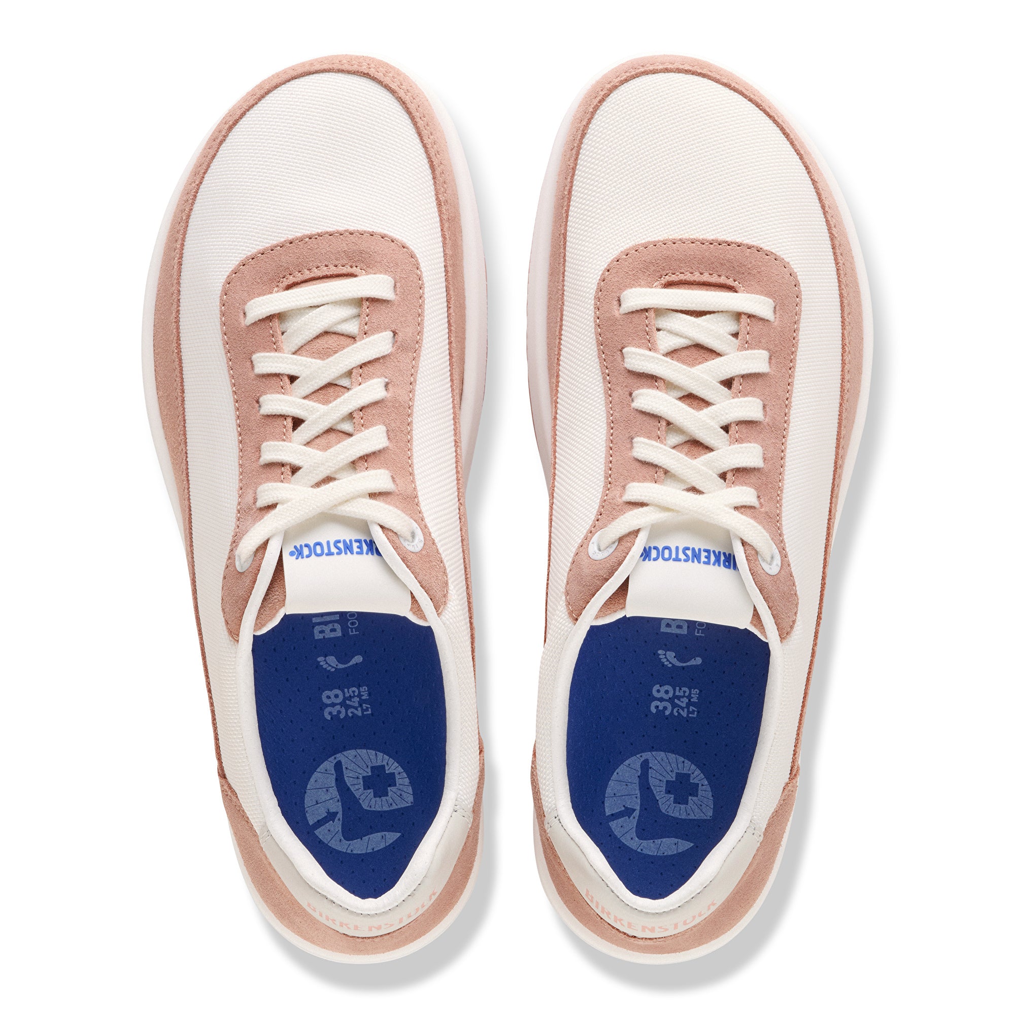 Pair of pink and white sneakers with blue soles on a white background