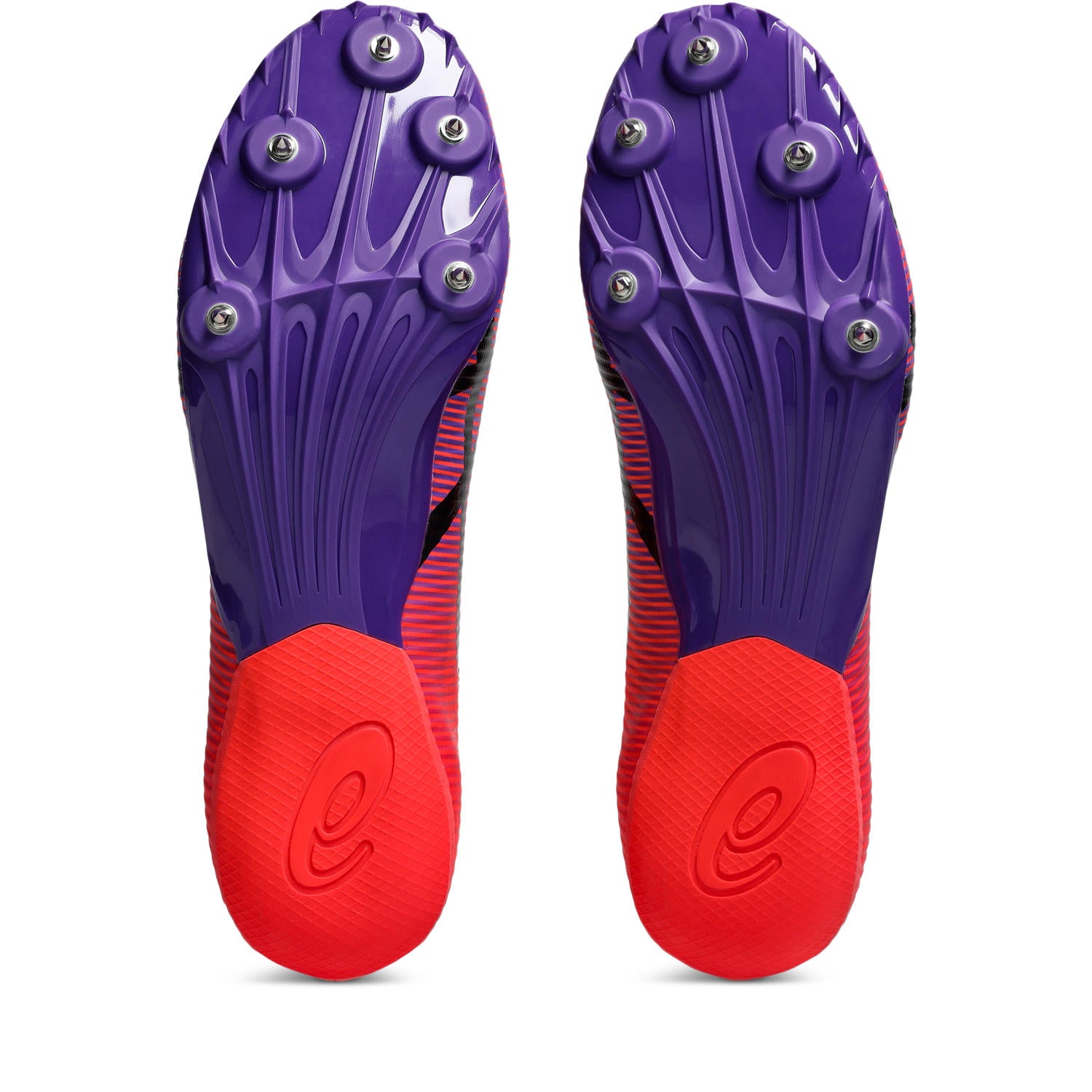 Purple and red cleats with spike patterns on a white background