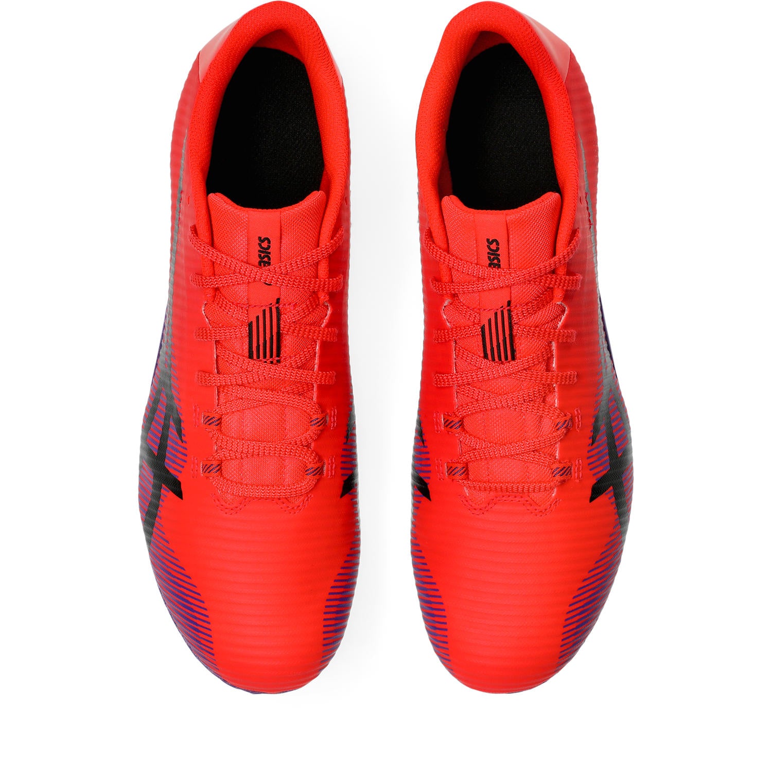 Pair of red soccer cleats with black accents on a white background