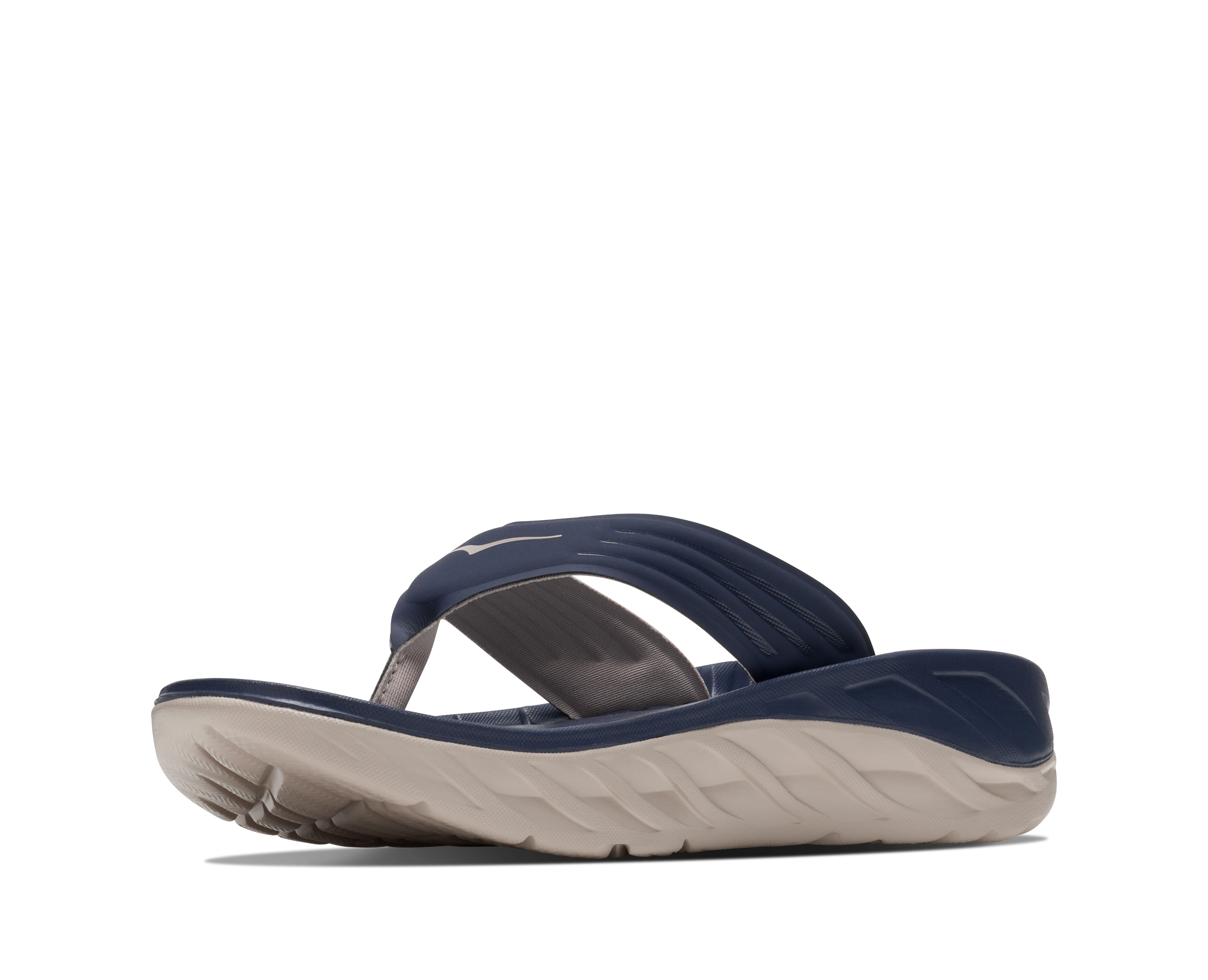 Navy and beige sandal on a white background