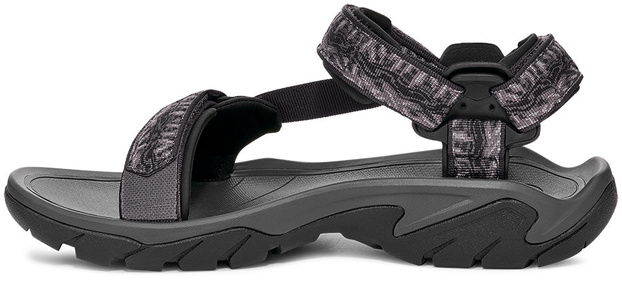 Black sandal with adjustable straps on a white background