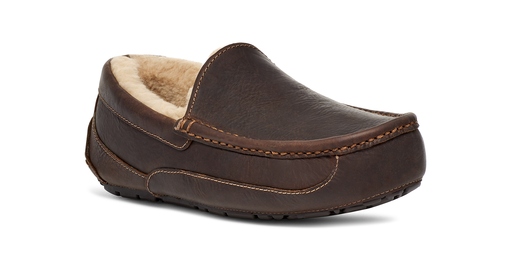 A single dark brown leather slip-on moccasin-style shoe with a light beige sherpa lining, shown from a three-quarters angle on a white background.