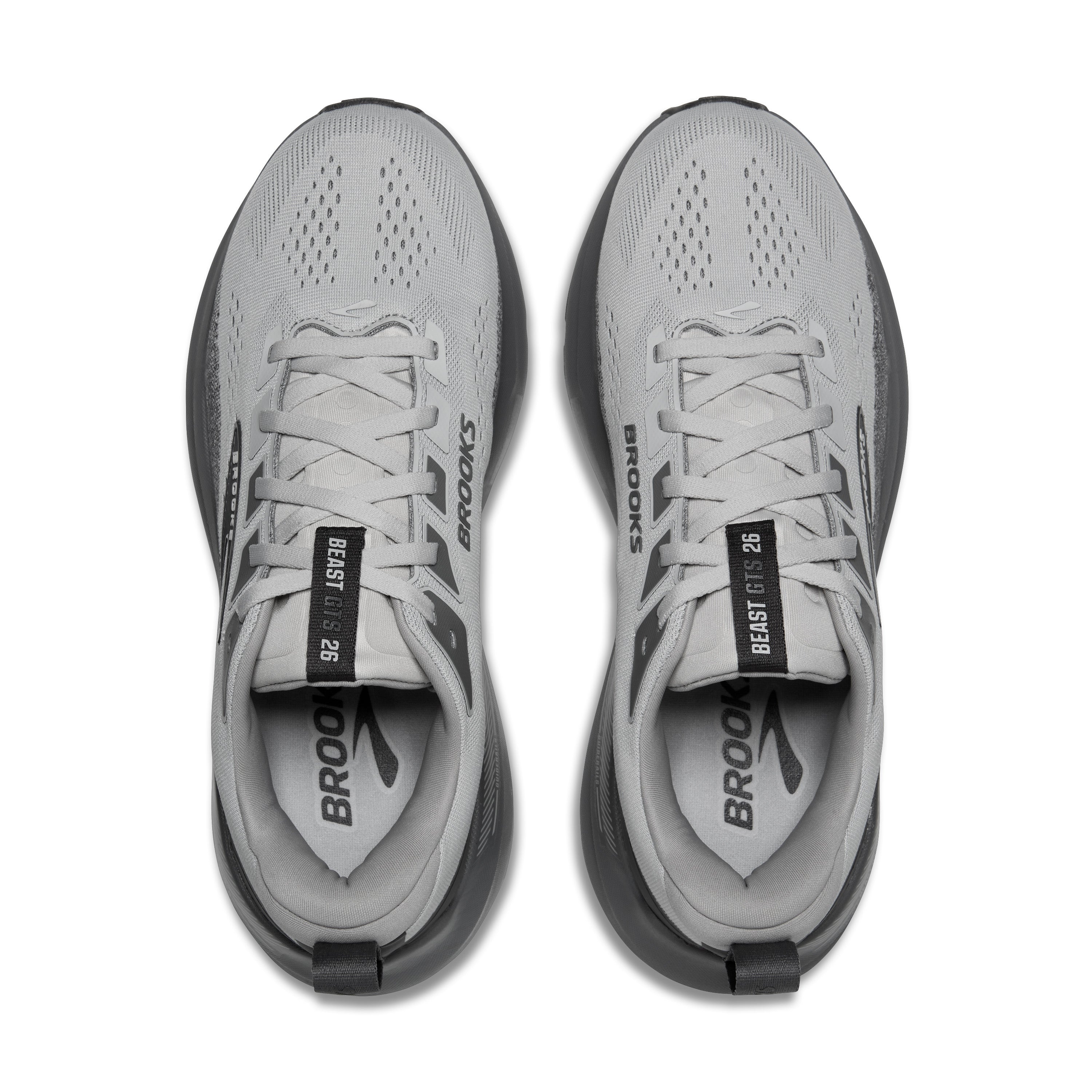 Gray running shoes with 'Brooks' branding on a white background