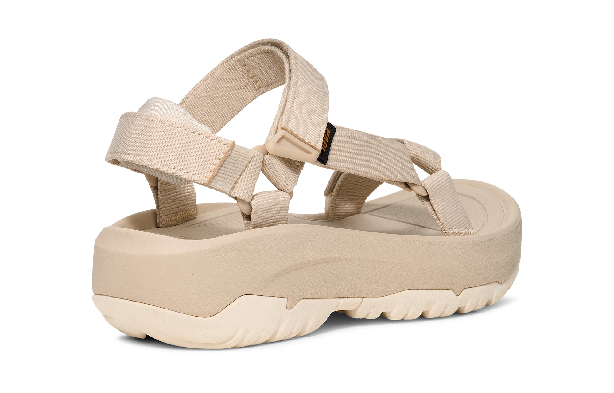 Beige sandal with platform sole on a white background