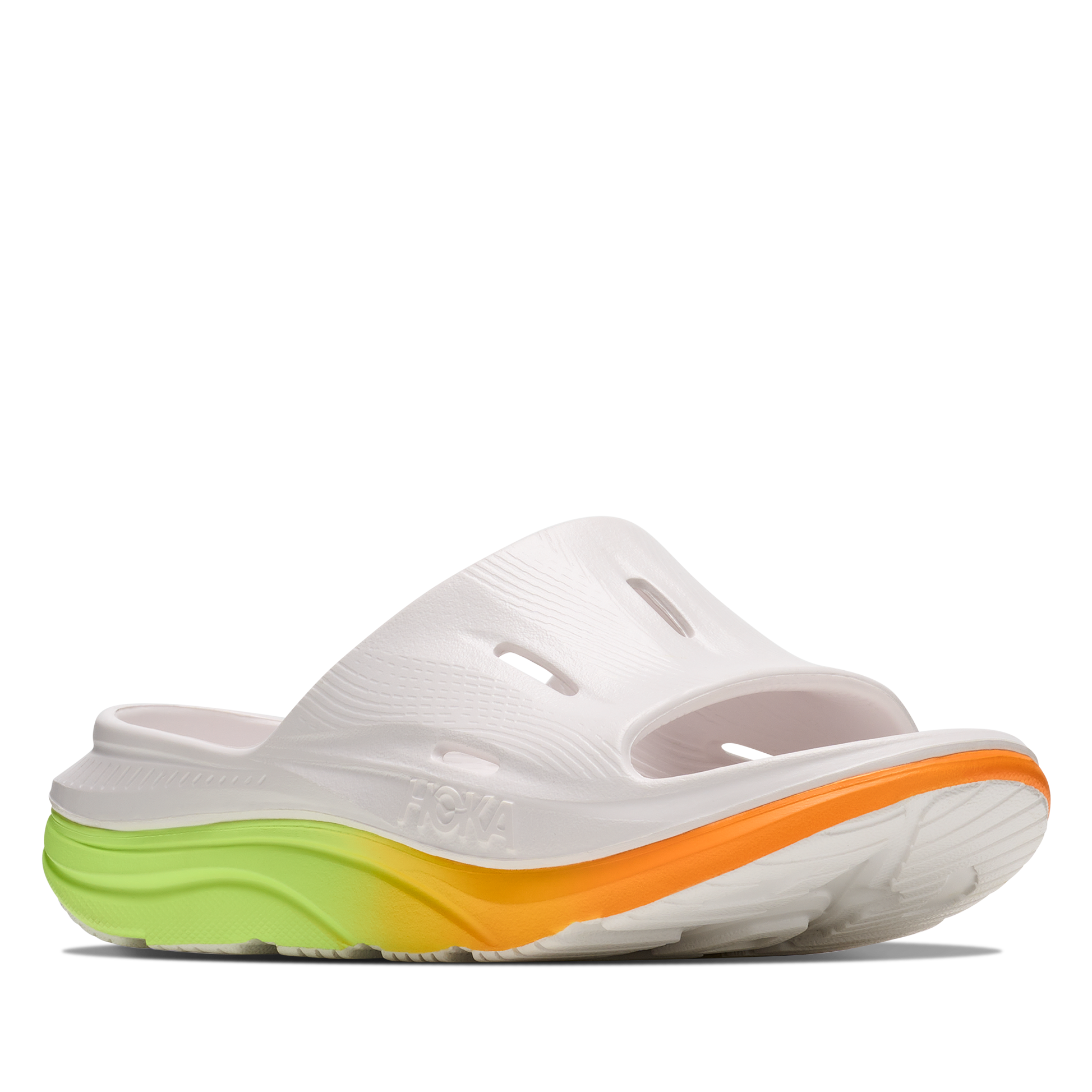White sandal with a colorful sole on a white background