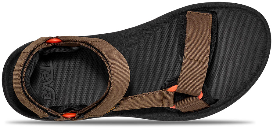 Brown sandal with orange accents on a white background
