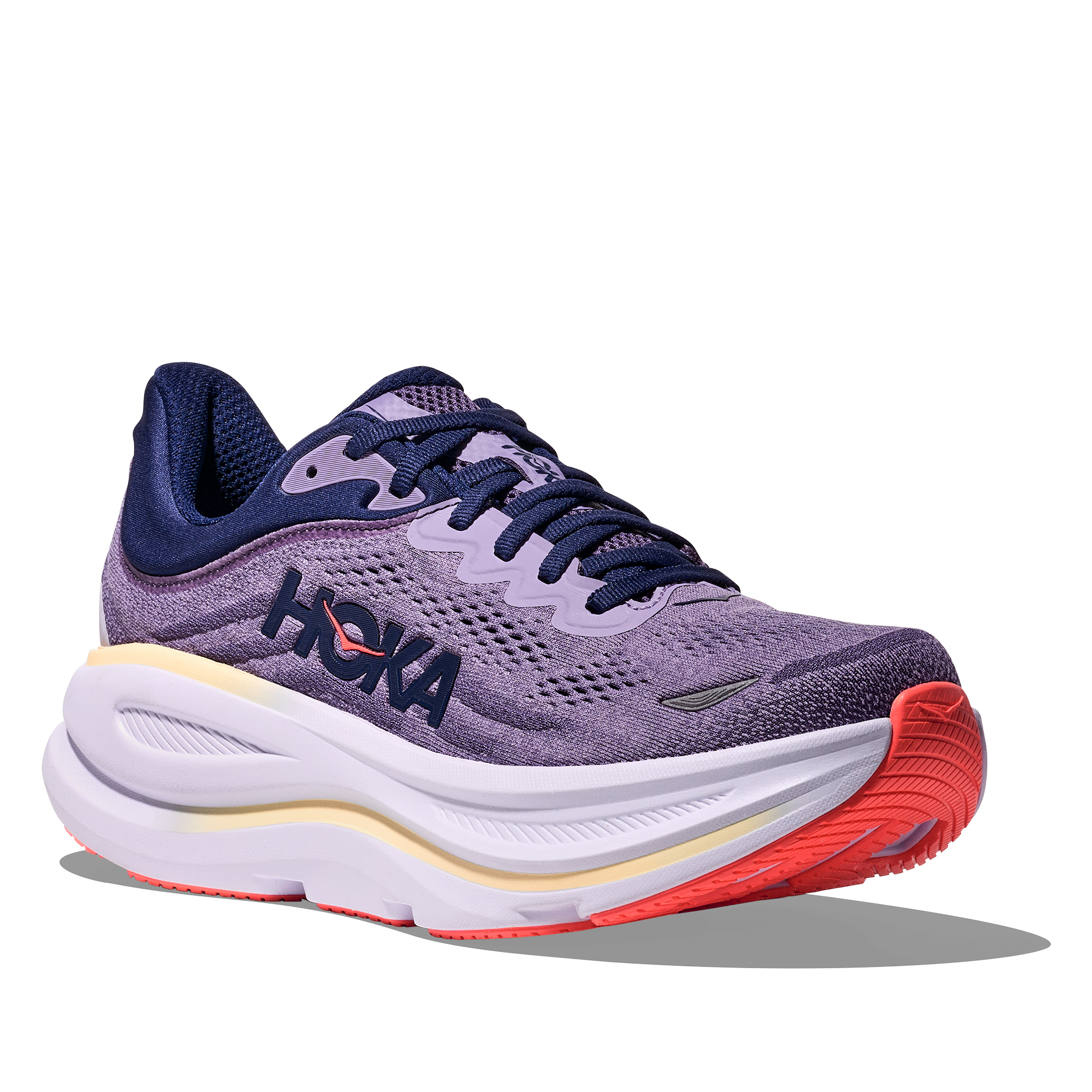 Purple running shoe with red sole on a white background