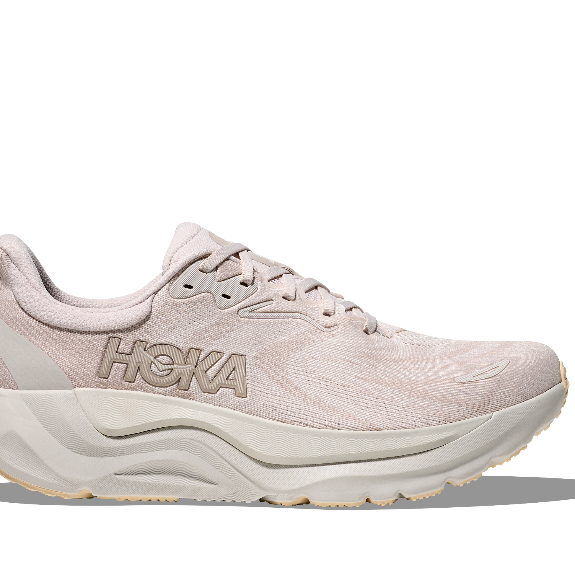 Pink running shoe with 'Hoka' branding on a white background