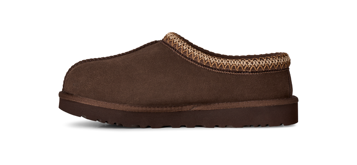 A single dark brown suede slipper with a textured brown and beige knit trim around the collar, shown from a side profile on a white background.
