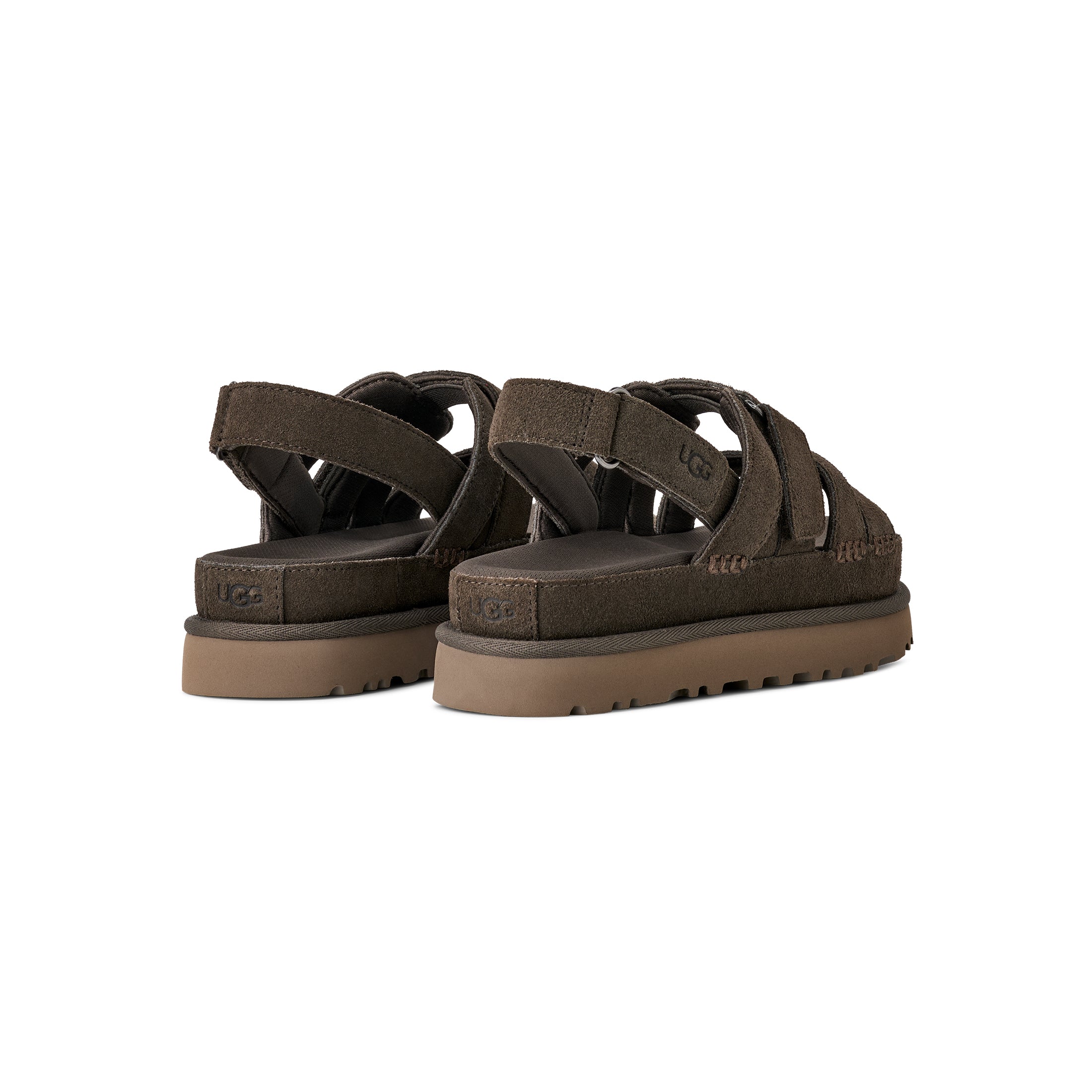 Brown sandals with multiple straps on a white background
