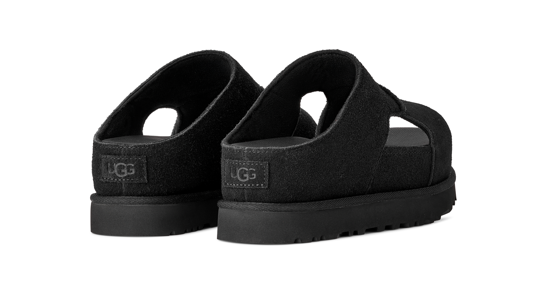 Black sandals with UGG logo on a white background