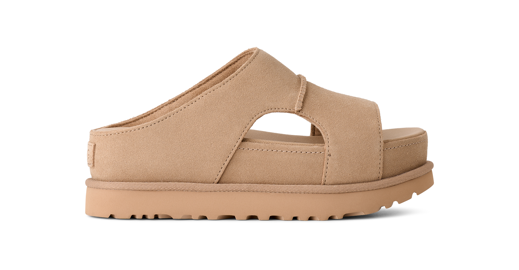 Tan sandal on a white background