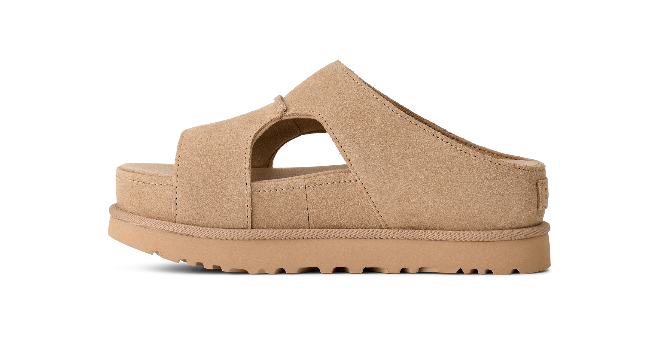 Tan sandal on a white background