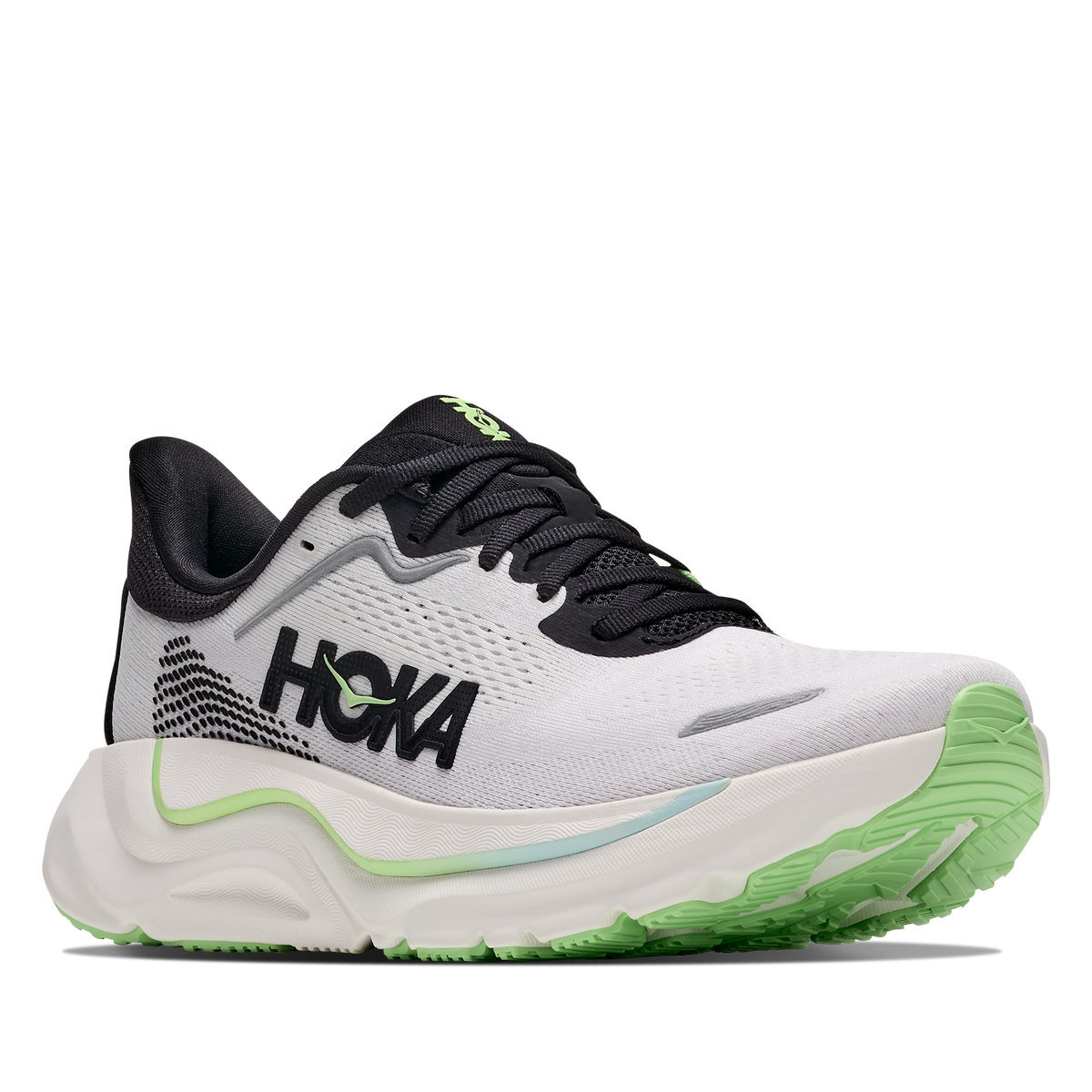A HOKA running shoe in white, black, and neon green, shown from a lateral side profile view against a plain white background.