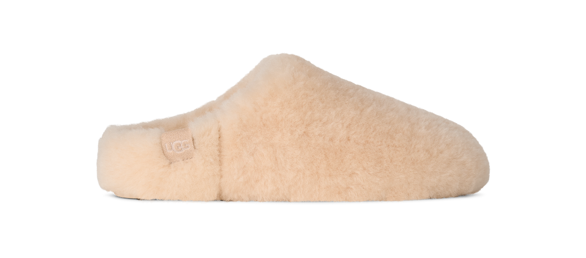 Beige slipper on a white background