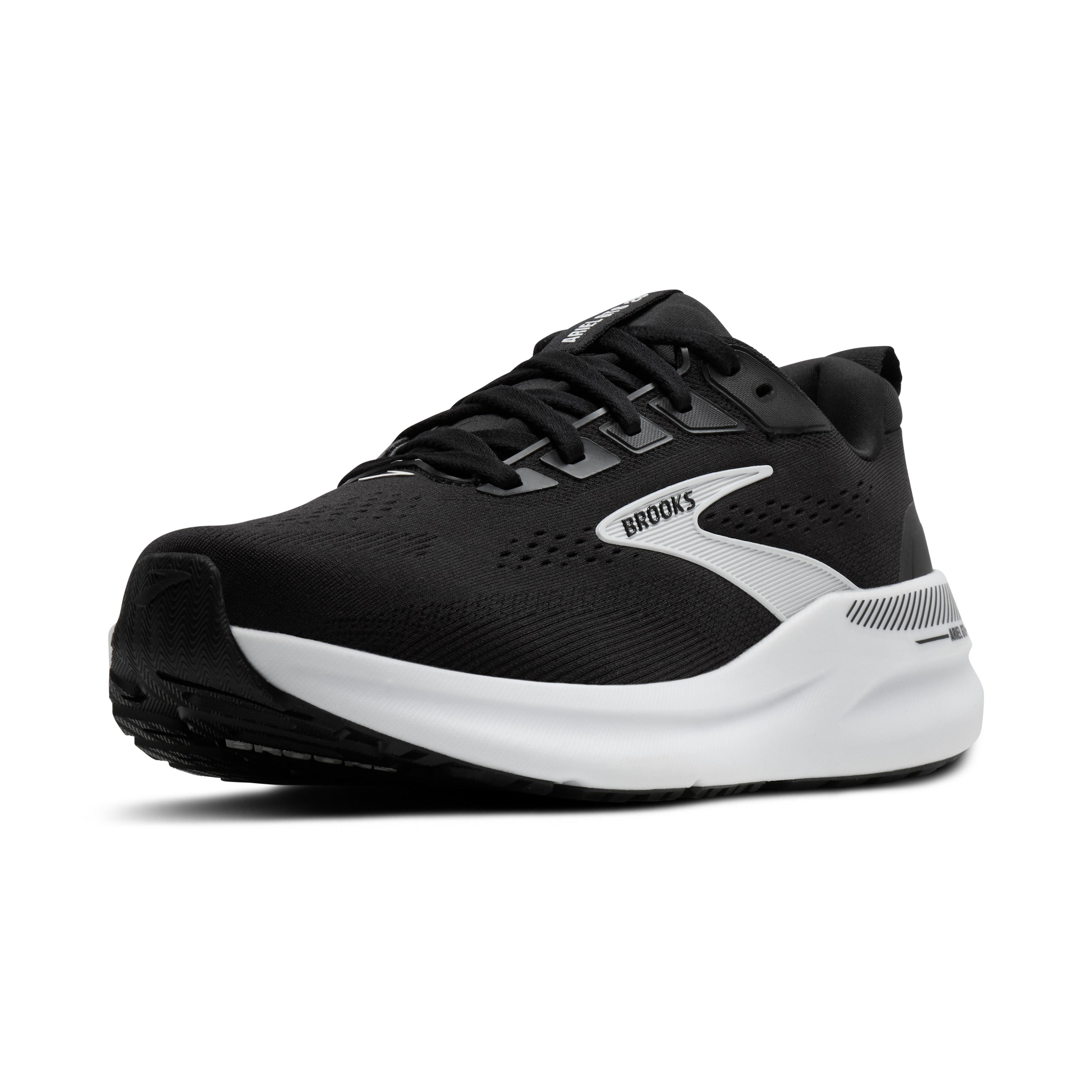 Black and white running shoe with 'Brooks' branding on a white background