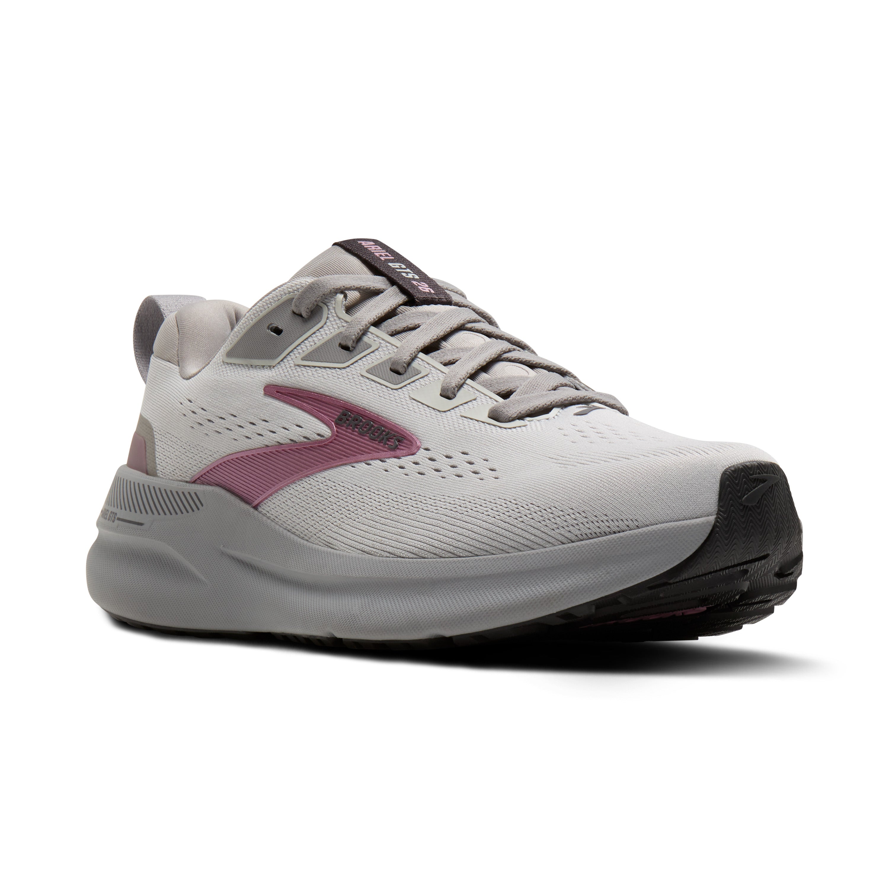 White and pink running shoe on a white background