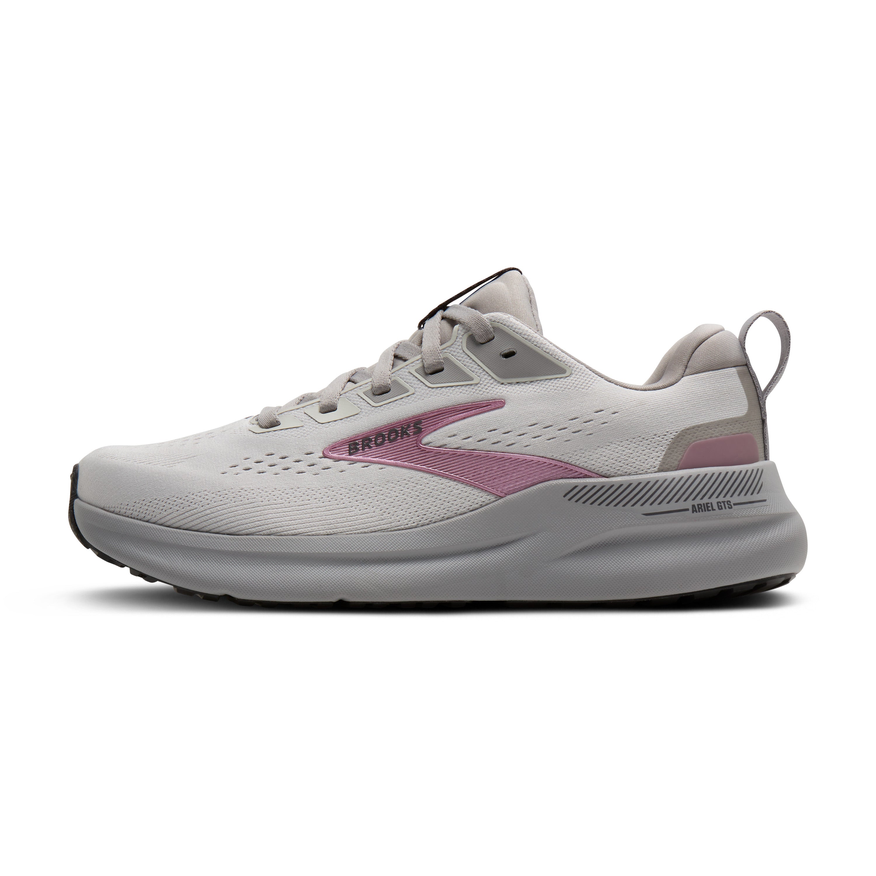 White running shoe with pink accents on a white background