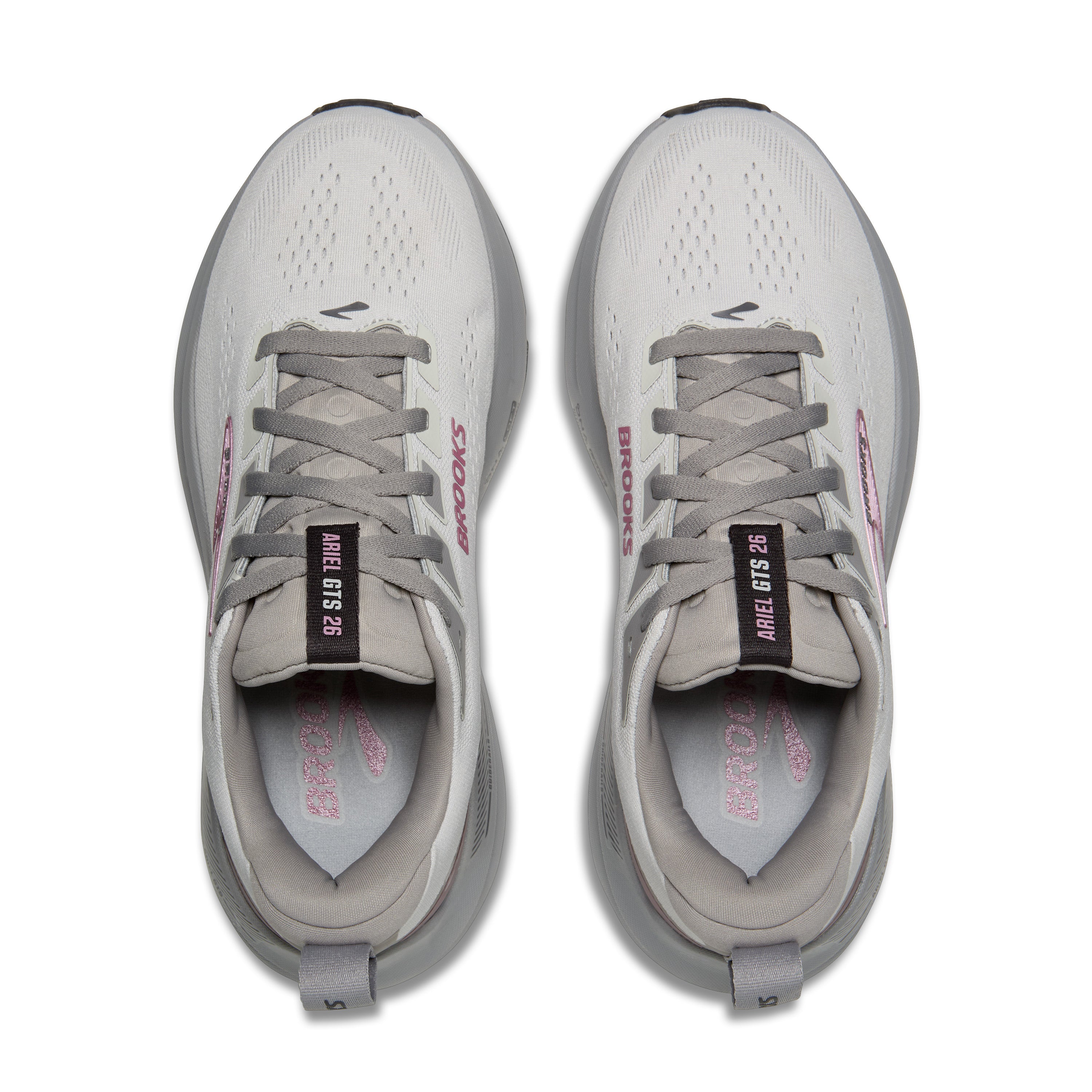 Pair of gray running shoes with visible branding on a white background
