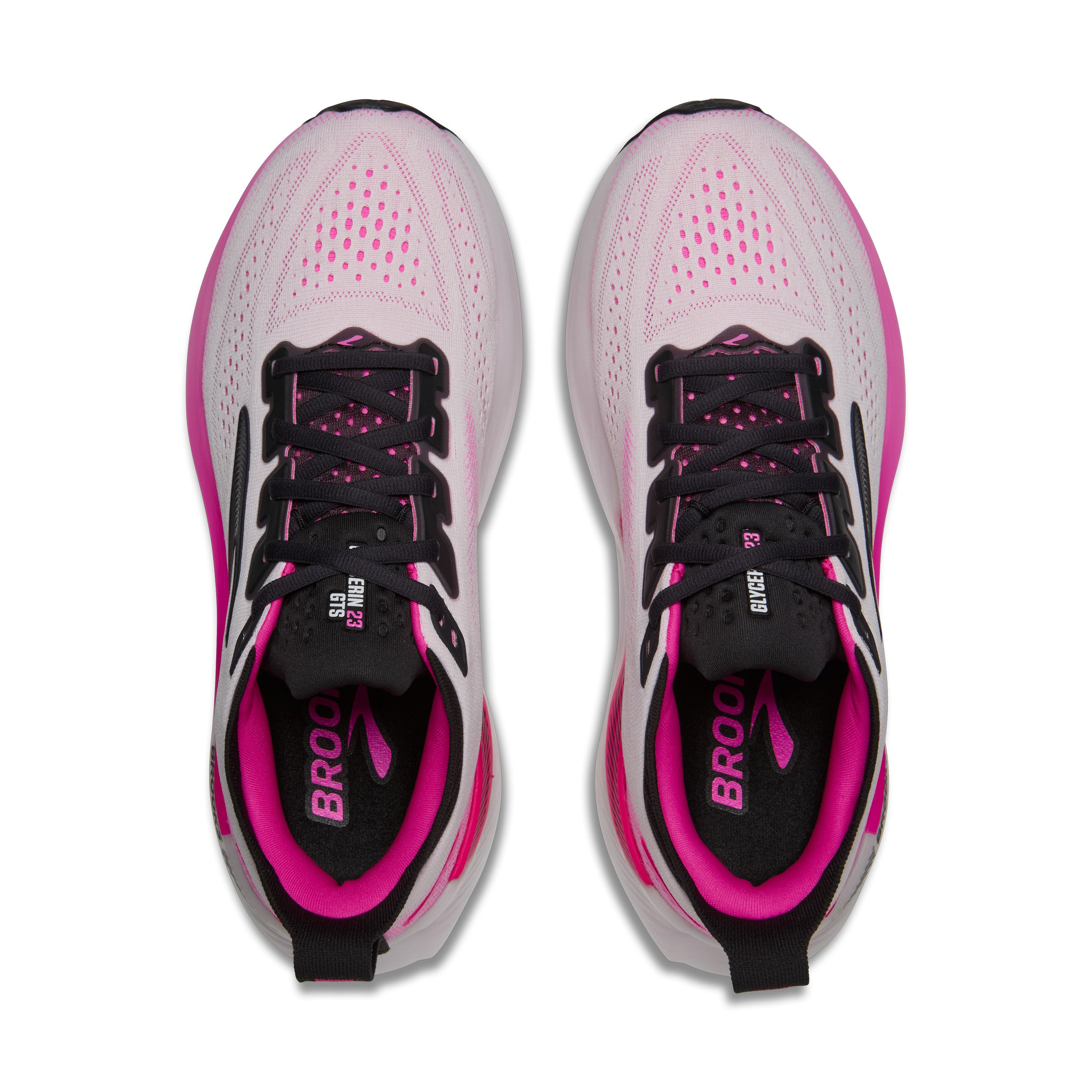 Pink and black running shoes with 'Brooks' branding on a white background