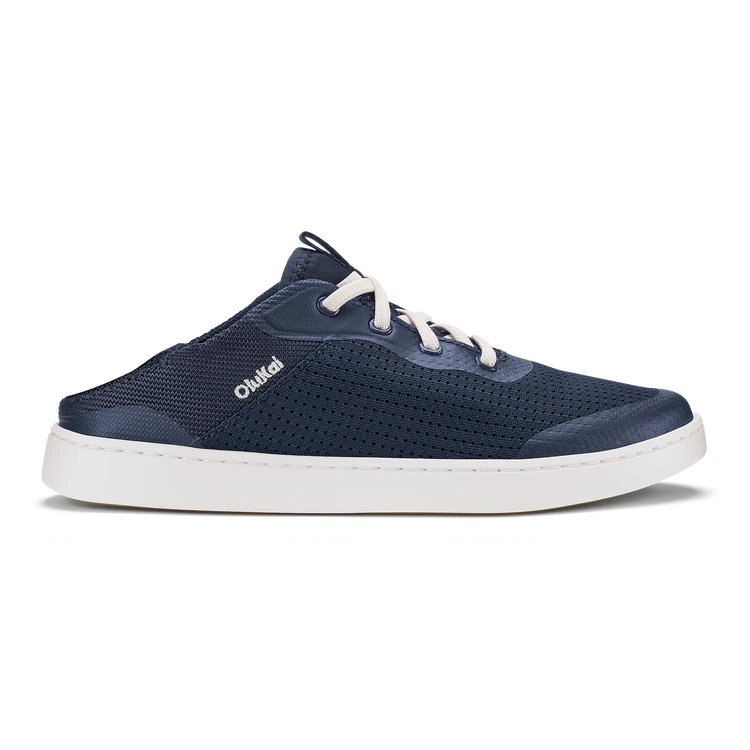 Navy blue sneaker with white sole on a white background