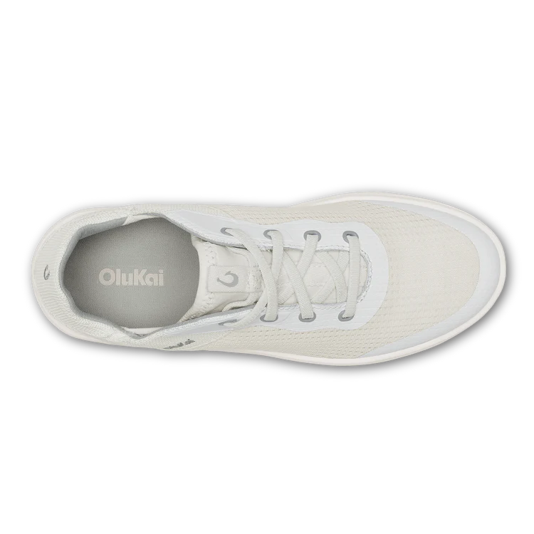 White sneaker with 'OluKai' branding on a white background
