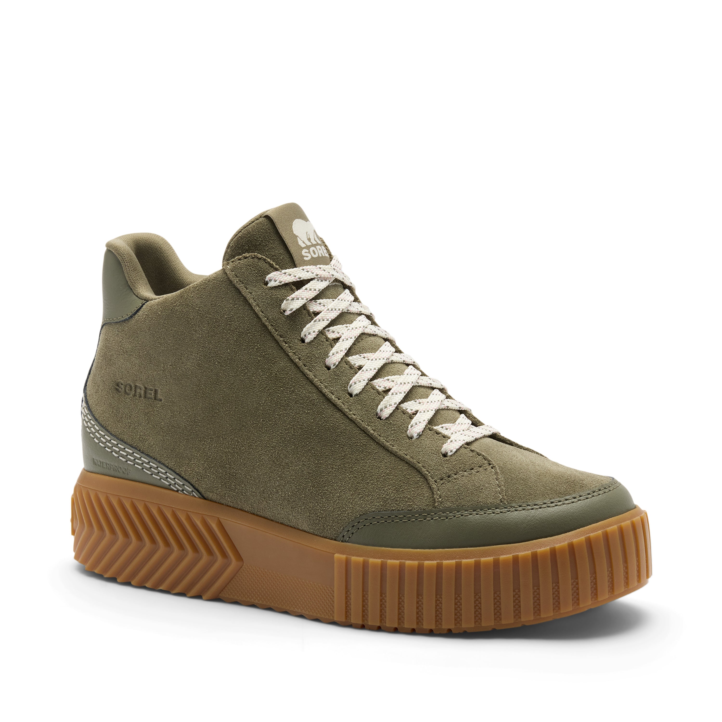 An olive green high-top sneaker by Koffi, featuring a suede-like upper, white braided laces, and a chunky brown gum sole with a textured chevron pattern.