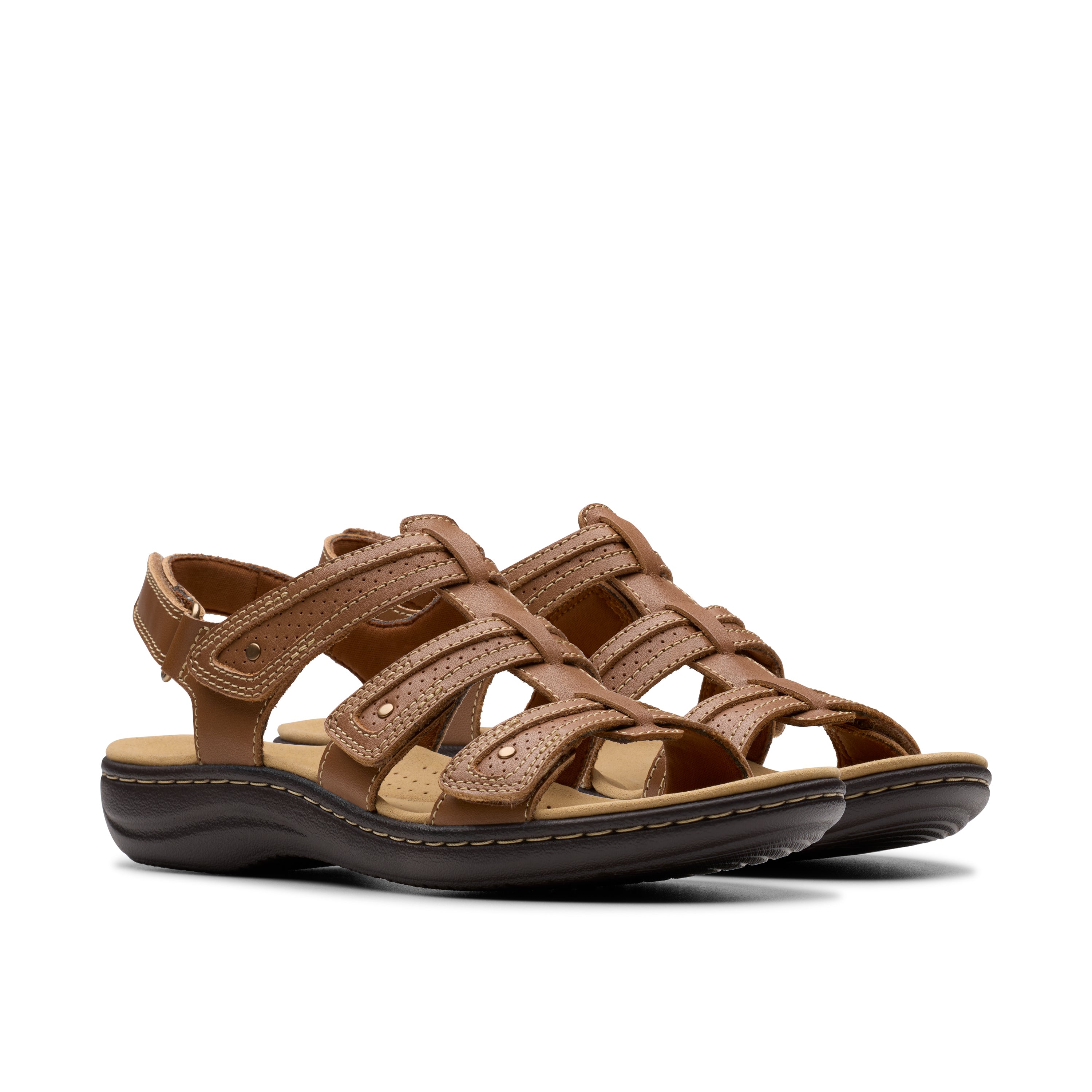 Pair of brown sandals on a white background