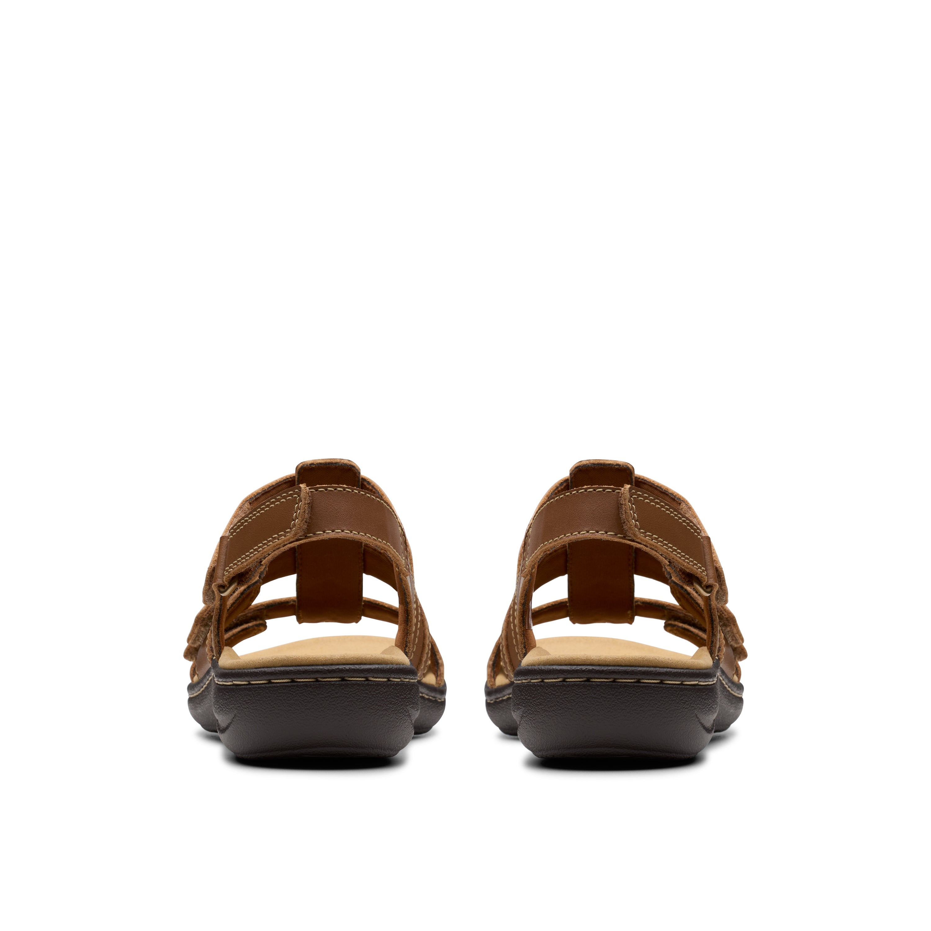 Pair of brown sandals on a white background