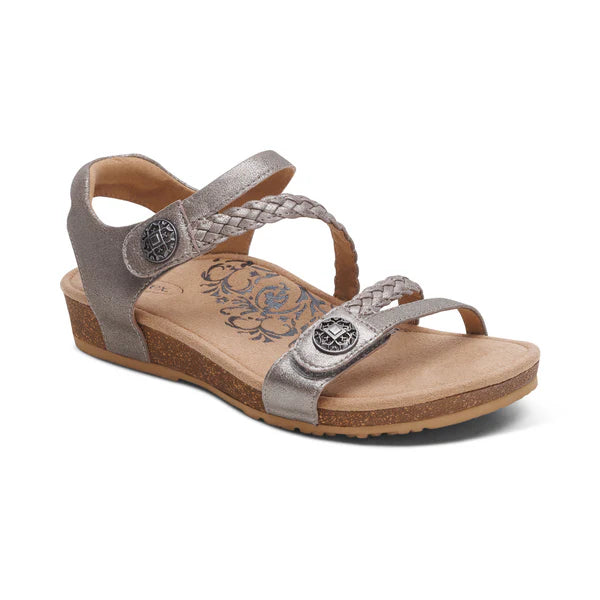 Silver sandal with braided straps on a white background
