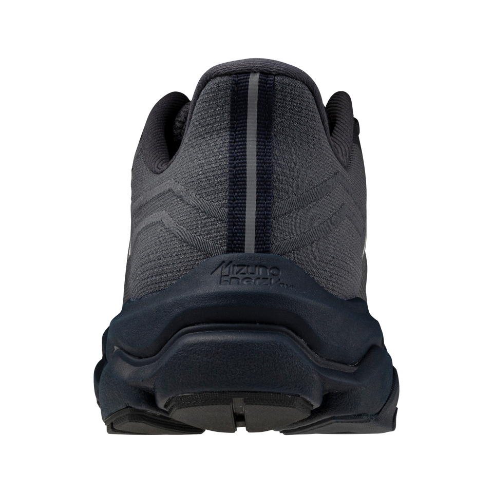 Black athletic shoe with 'Mizuno' branding on a white background