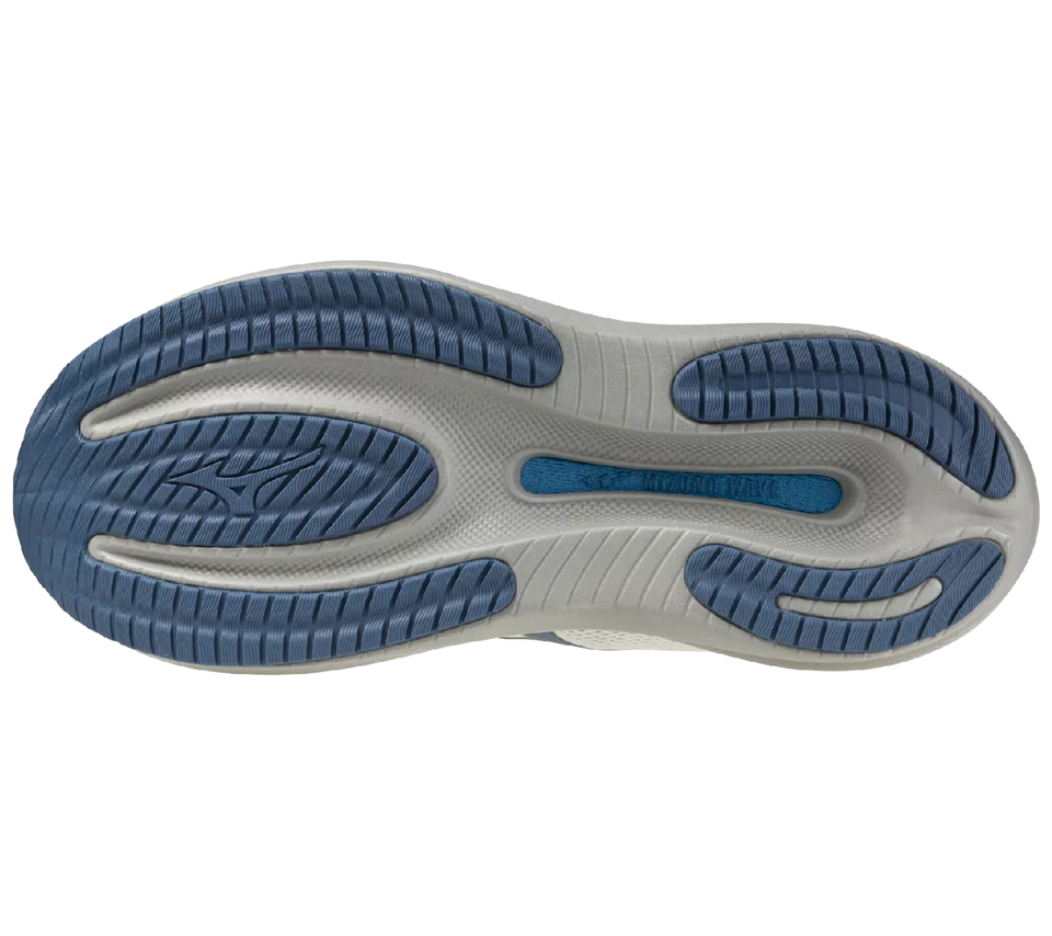 Sole of a shoe with blue and gray design on a white background