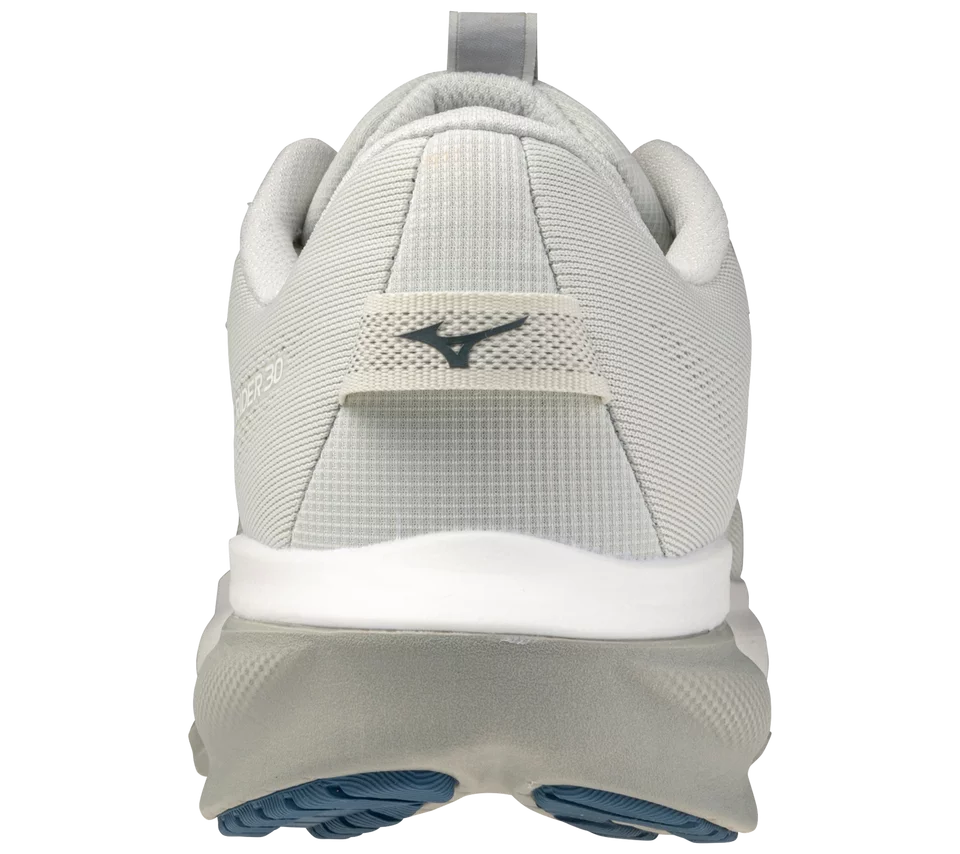 White running shoe with a visible brand logo on a white background