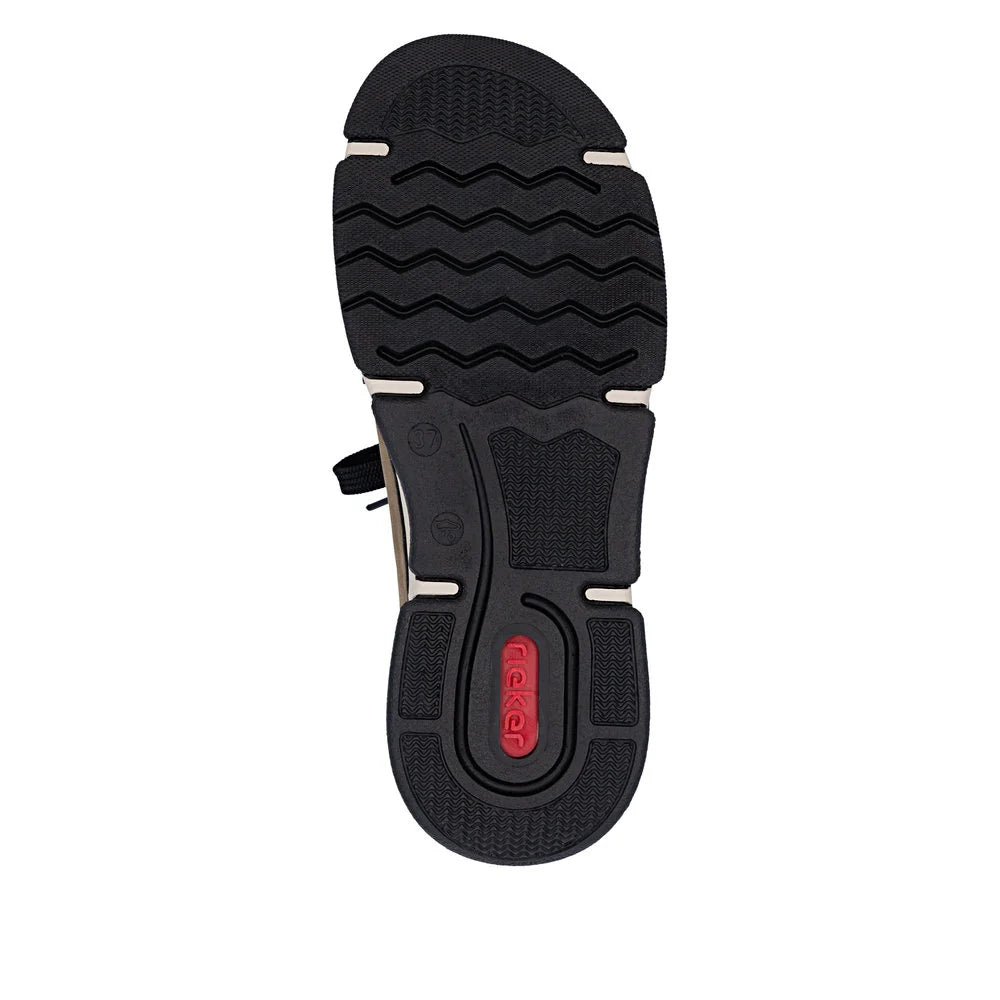 Black sole of a shoe with a red brand logo on a white background