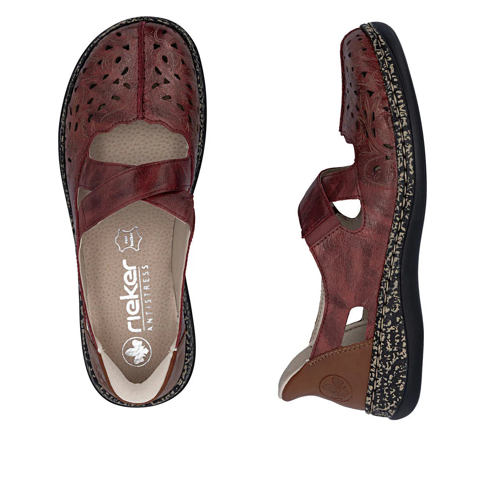 Brown sandal with black sole on a white background