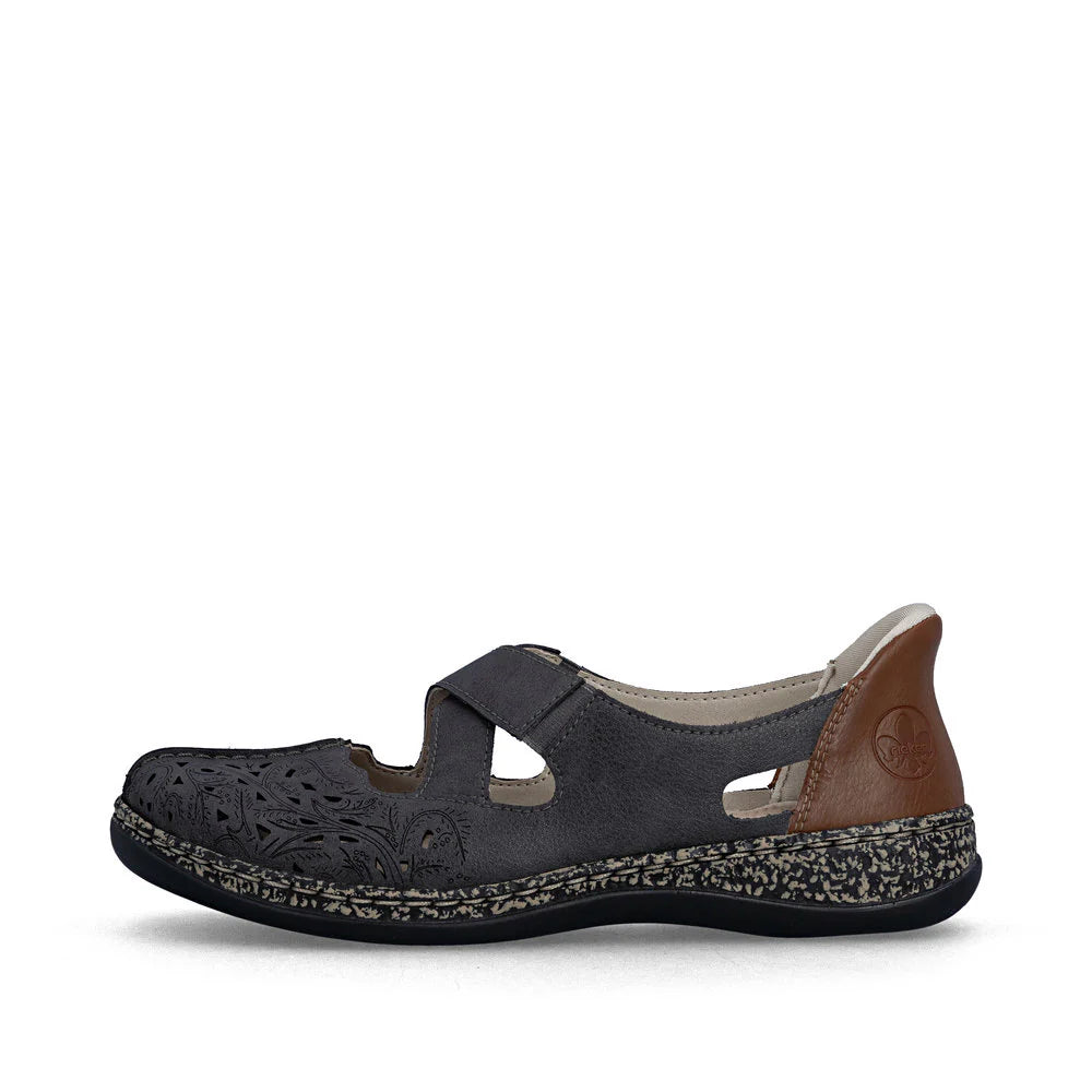 Black sandal with brown accents on a white background