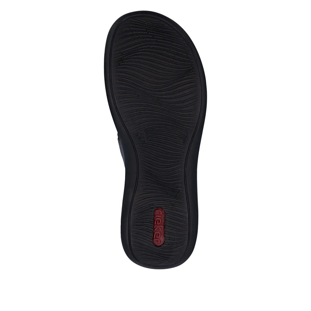 Black sandal sole with brand logo on a white background