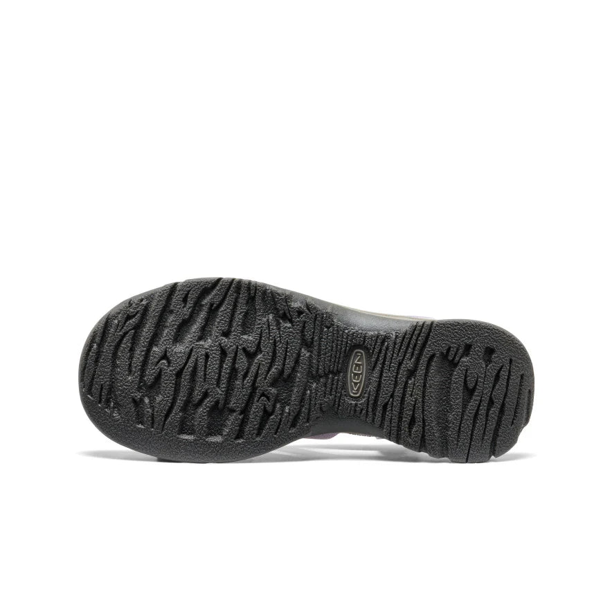 Black shoe sole with brand logo on a white background