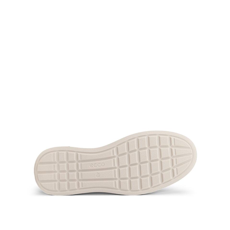 White sneaker sole with brand logo on a white background