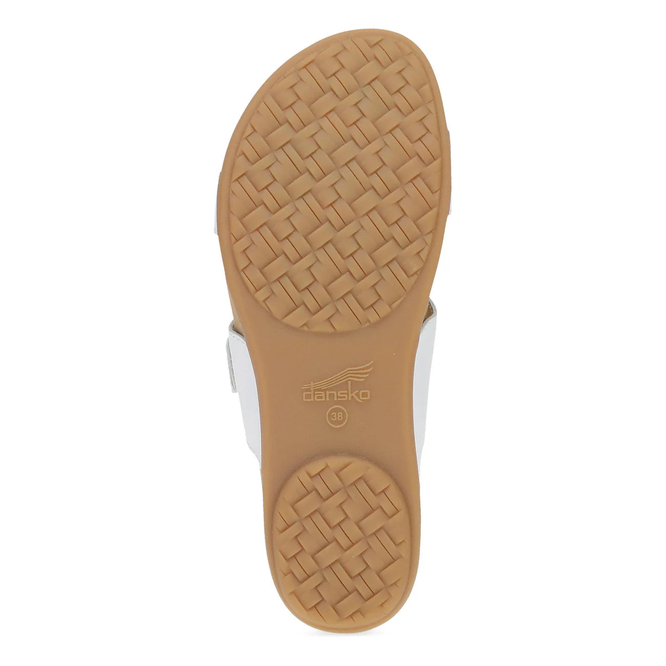 Close-up of a sandal sole with tan rubber outsole and white inner sole, featuring the Dansko logo.