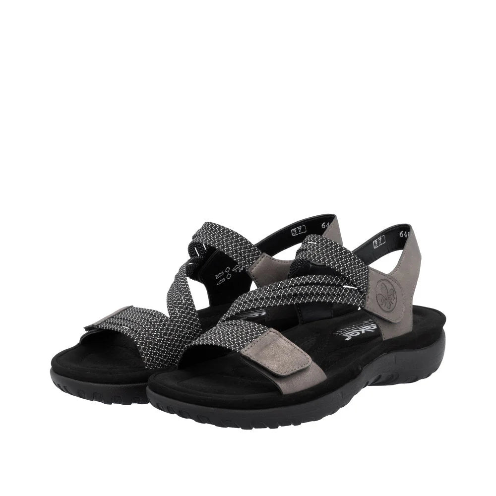 Pair of black and gray sandals on a white background